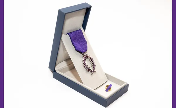 The Order of Academic Palms (Ordre des Palmes Académiques) rank of knight (chevalier) silver palm awarded for educational achievements fostering an appreciation of French language and culture.