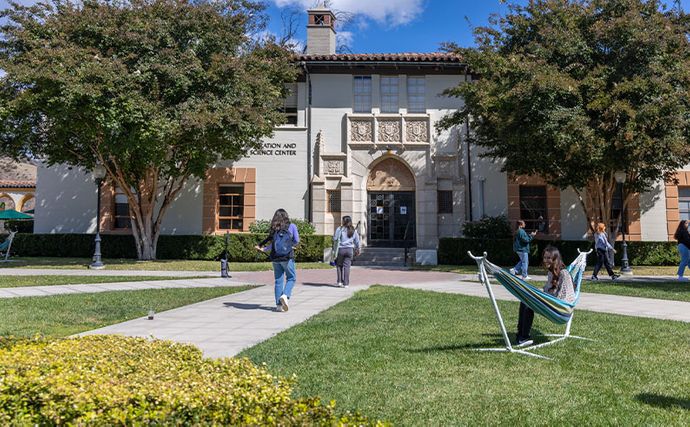 Students walking around circle