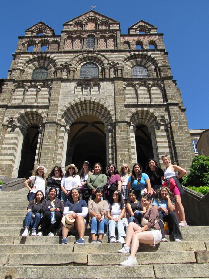 Students in front of a church at Le Puy, during the summer 2022 pilgrimage trip to France