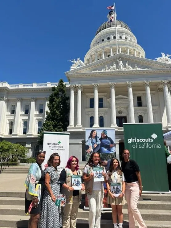 Krishauna Hines-Gaither, PhD (first from left), vice president for Strategic Initiatives and Partnerships, and Breann Branch, PhD (last from left), director of the Center for the Advancement of Women, attend the launch of the California 2026 State of the Girl Report at the California State Capitol in Sacramento on June 23.