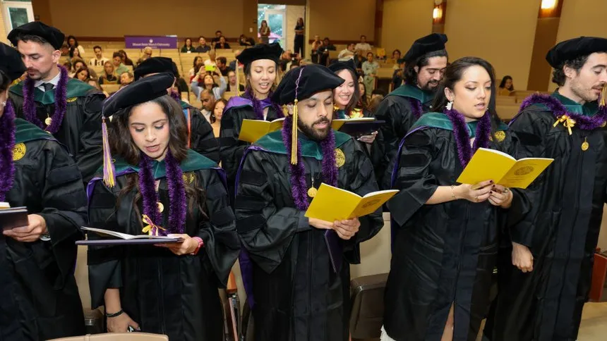 DPT graduates participating in the graduation ceremony