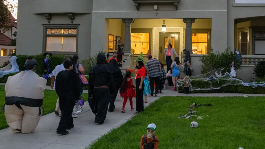 Children in costumes going trick or treating